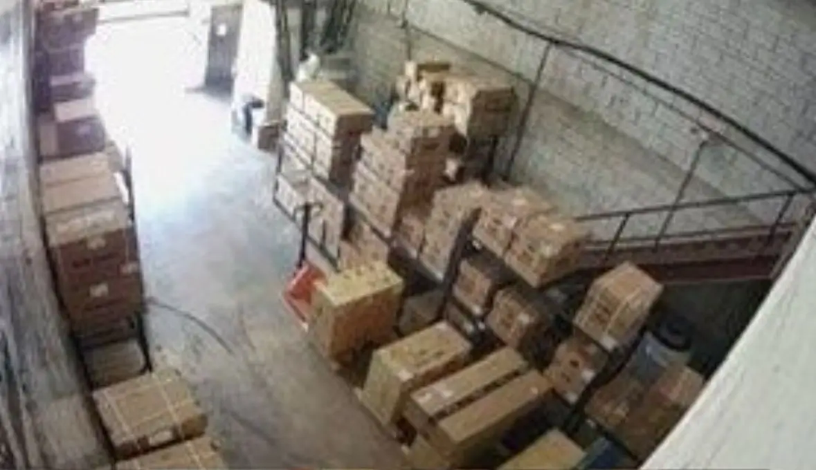 Workshop area with tools and technicians at work